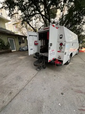 Magnet Plumbing service vehicle on-site for Water Heater Repair in University of Miami